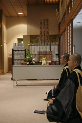Priests listening to a sermon during the Higan ceremony